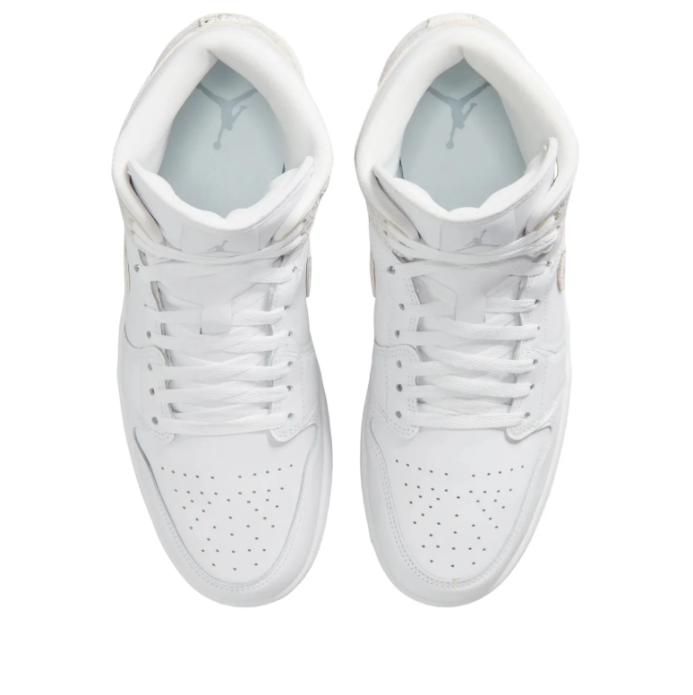 Air Jordan 1 Mid White Sneakers with Metallic Silver Accents